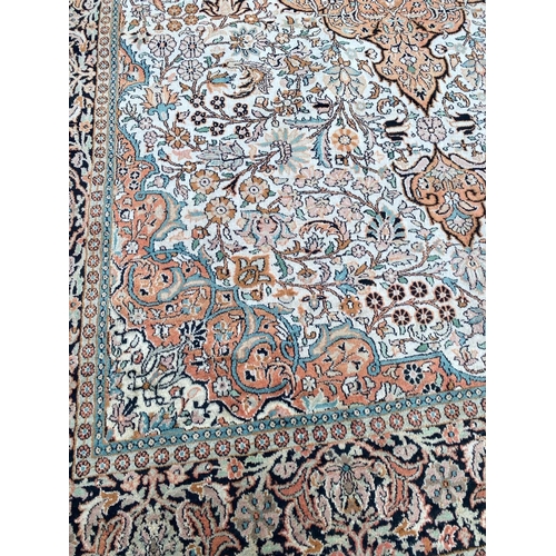 83 - FINE PURE SILK HEREKE DESIGN CARPET, 280cm x 190cm.