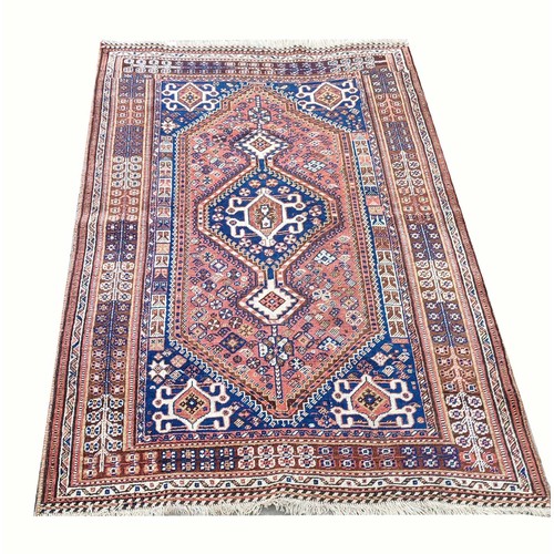 104 - A QASHQAI RUG, circa 1930, 200cm L x 125cm W.