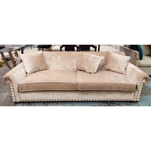 385 - SOFA , sand coloured fabric upholstery, gilt metal studded detail, 235cm W approx.