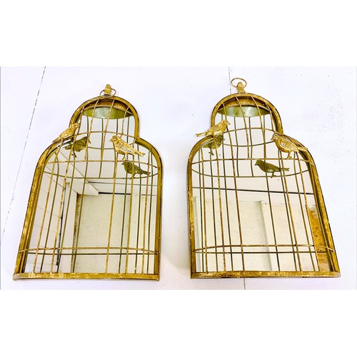 342 - WALL MIRRORS, 57cm high, 35cm wide, a pair, caged gilt metal frame with bird detail. (2)