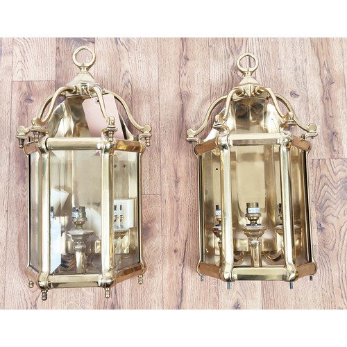 408 - WALL LANTERNS, a pair, Victorian style, solid brass, one missing piece of glass. 52cm high, 25cm wid... 