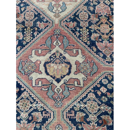 101 - ANTIQUE QASHQAI RUG, 200cm x 130cm.