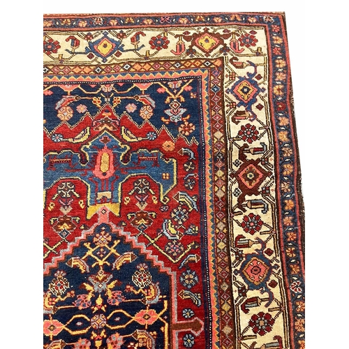 108 - ANTIQUE NORTHWEST PERSIAN RUG, 215cm x 128cm.