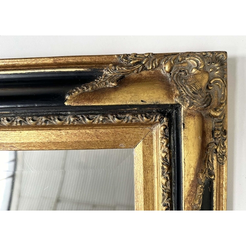 116 - WALL MIRROR, Italian style rectangular bevelled mirror with moulded black frame and gilt moulded cor... 