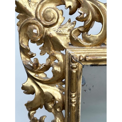 125 - FLORENTINE WALL MIRROR, late 19th/early 20th century Florentine carved giltwood, 90cm H x 74cm W.