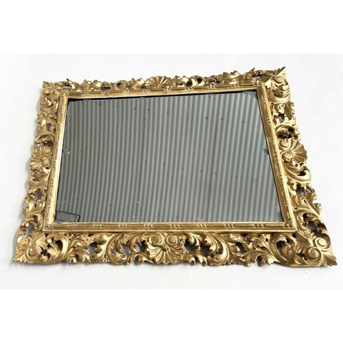 125 - FLORENTINE WALL MIRROR, late 19th/early 20th century Florentine carved giltwood, 90cm H x 74cm W.