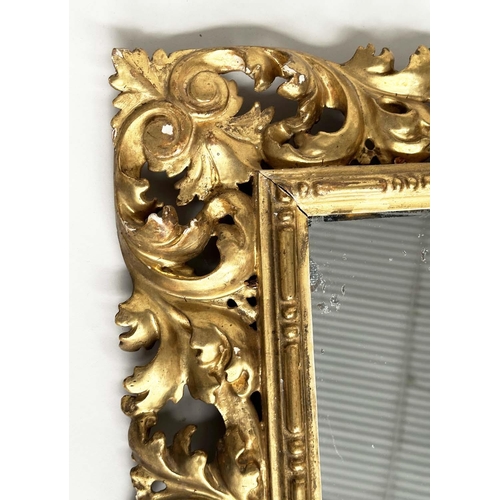 125 - FLORENTINE WALL MIRROR, late 19th/early 20th century Florentine carved giltwood, 90cm H x 74cm W.