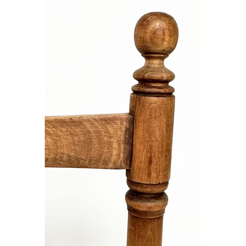 127 - HALL SEAT, early 20th century Edwardian fruitwood with turned and pierced spindle back and studded l... 