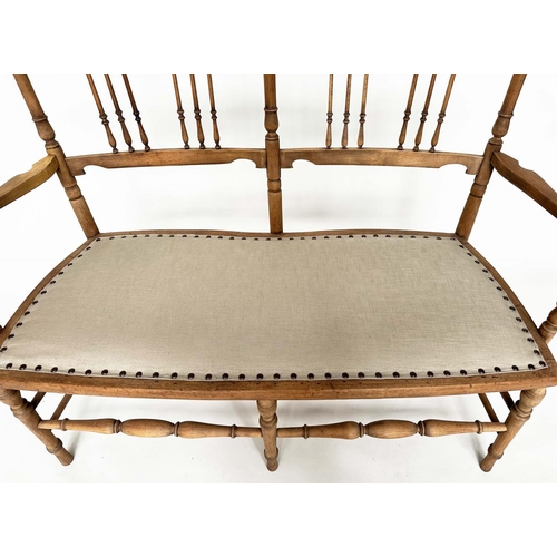 127 - HALL SEAT, early 20th century Edwardian fruitwood with turned and pierced spindle back and studded l... 