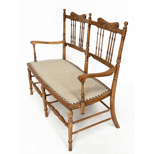 127 - HALL SEAT, early 20th century Edwardian fruitwood with turned and pierced spindle back and studded l... 