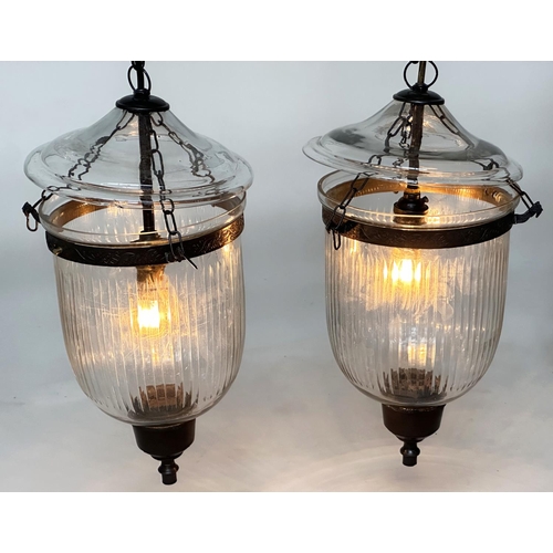 129 - BELL JAR HALL LANTERNS, a pair, glass reeded tapering and bronze style mounted, 58cm H x 34cm. (2)