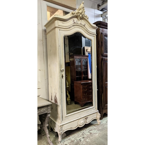 153 - ARMOIRE, late 19th century French in a distressed painted finish, with mirrored door enclosing adjus... 