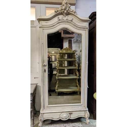 153 - ARMOIRE, late 19th century French in a distressed painted finish, with mirrored door enclosing adjus... 