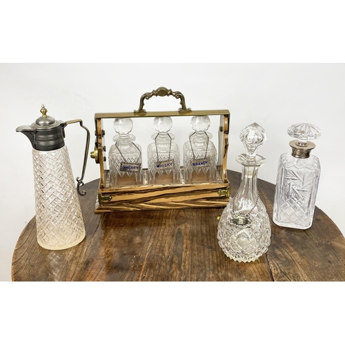 5 - BETJEMANNS VICTORIAN PATENT TANTALUS, having three cut glass decanters in simulated rosewood case wi... 