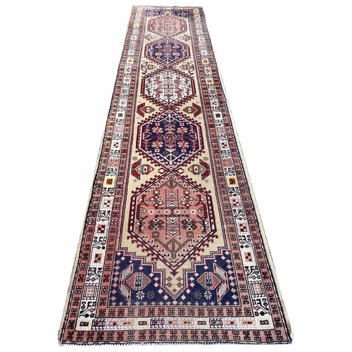 88 - ANTIQUE SERAPI RUNNER, 290cm x 72cm.