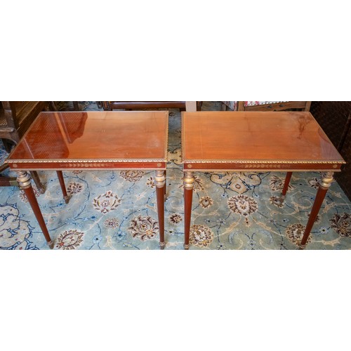 154 - LOW TABLES, a pair, Brazilian mahogany with gilt detail and inset glass tops, each 42cm x 62cm x 58c... 