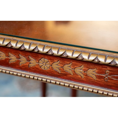 154 - LOW TABLES, a pair, Brazilian mahogany with gilt detail and inset glass tops, each 42cm x 62cm x 58c... 