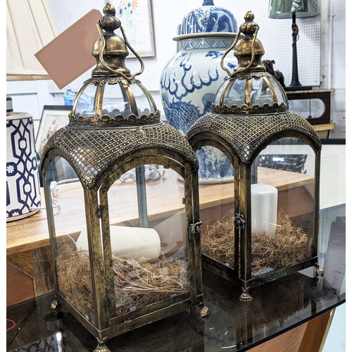 416 - LANTERNS, a pair, gilt metal and glazed, 58cm H. (2)