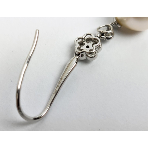 5 - A PAIR OF 18CT WHITE GOLD PEARL AND DIAMOND PENDANT EARRINGS, hook fastenings.