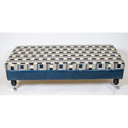 541 - HEARTH STOOL, 35cm H x 128cm W x 63cm D, blue leather and chequered fabric on chrome castors.