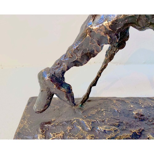 540 - FIGURE OF A DOG, BRONZE, abstract form, in standing position, 30cm high, 60cm wide, 12cm deep