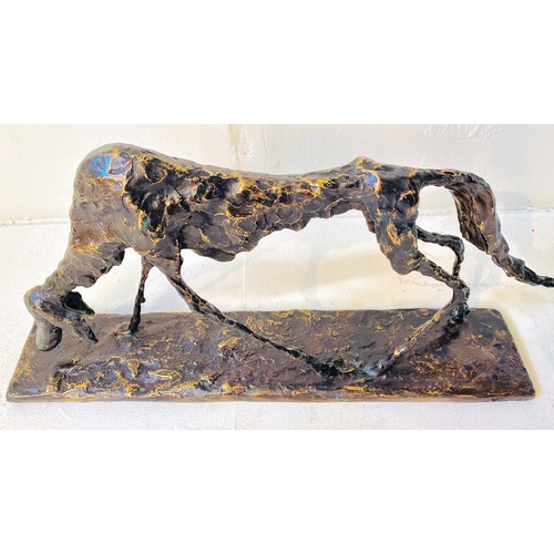 540 - FIGURE OF A DOG, BRONZE, abstract form, in standing position, 30cm high, 60cm wide, 12cm deep