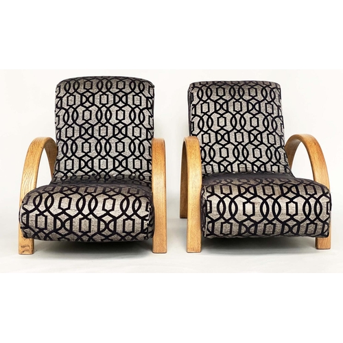 555 - HEAL'S BANANA LOUNGE CHAIRS, a pair, with oak bentwood arms, 76cm W. (2)