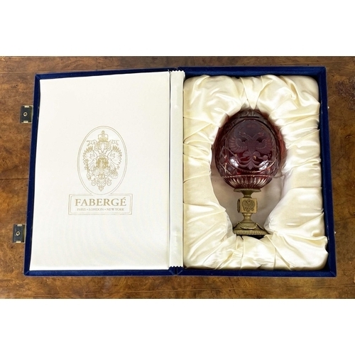 25 - FABERGE EGG, Bohemian cut glass with eagle armorial heraldry on stem in original blue box, 18cm H.