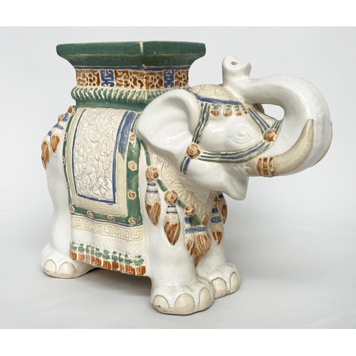 449 - ELEPHANT STOOLS, a pair, Indian ceramic polychrome of elephants in ceremonial regalia with seats, 60... 