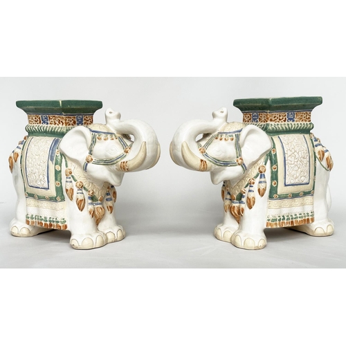 449 - ELEPHANT STOOLS, a pair, Indian ceramic polychrome of elephants in ceremonial regalia with seats, 60... 