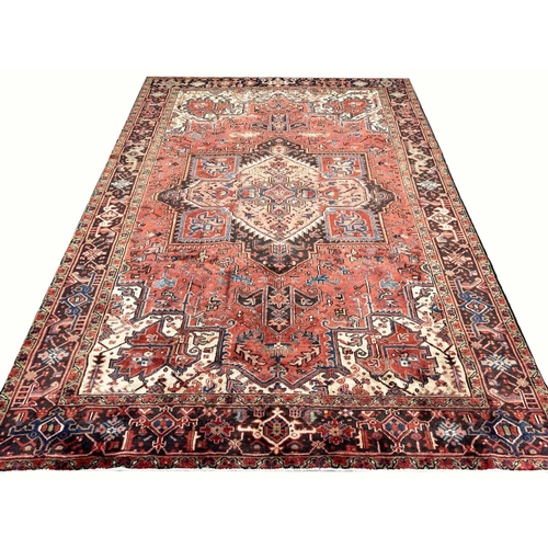 107 - PERSIAN HERIZ CARPET, 340cm x 245cm.