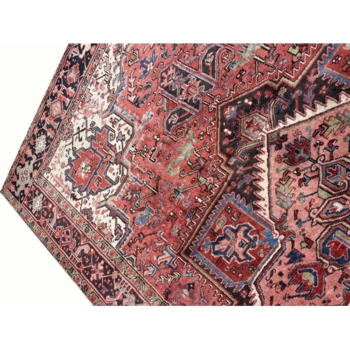 107 - PERSIAN HERIZ CARPET, 340cm x 245cm.