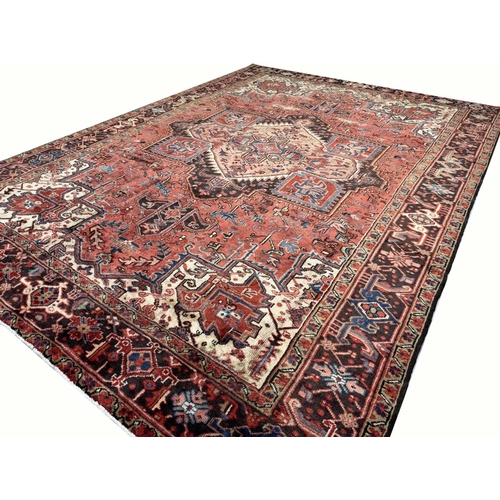 107 - PERSIAN HERIZ CARPET, 340cm x 245cm.