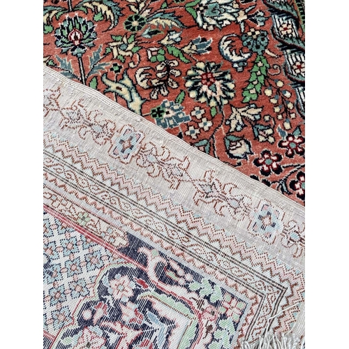 109 - FINE PURE SILK HEREKE DESIGN RUG, 130cm x 80cm.