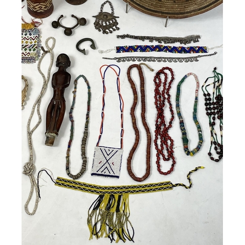 2 - AFRICAN TRIBAL ITEMS, various including a West African bronze Manilla (money) and ankle bracelet two... 