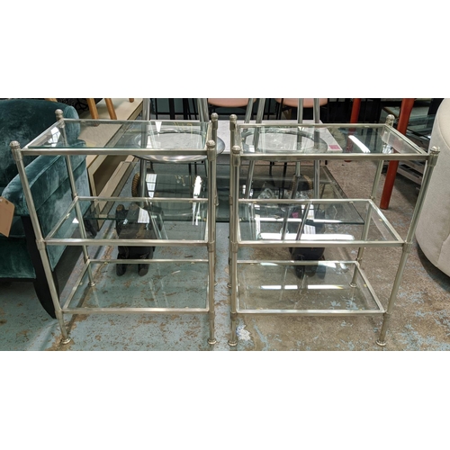 547 - SIDE TABLES, a pair, 60.5cm x 37.5cm x 80cm, each three tier, glass and polished metal. (2)