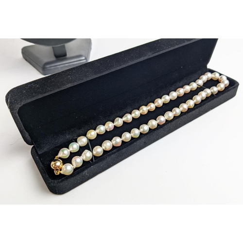 7 - CULTURED PEARL SINGLE STRAND NECKLACE, each pearl of round irregular form, 8mm diam approx, 14ct gol... 