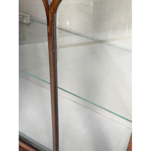 115 - ART DECO DISPLAY CASE, burr walnut with two glazed arched panelled doors, enclosing shelves, 117cm W... 