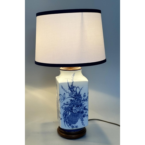 122 - TABLE LAMPS, a pair, Chinese blue and white ceramic on carved stands (with shades), 70cm H. (2)