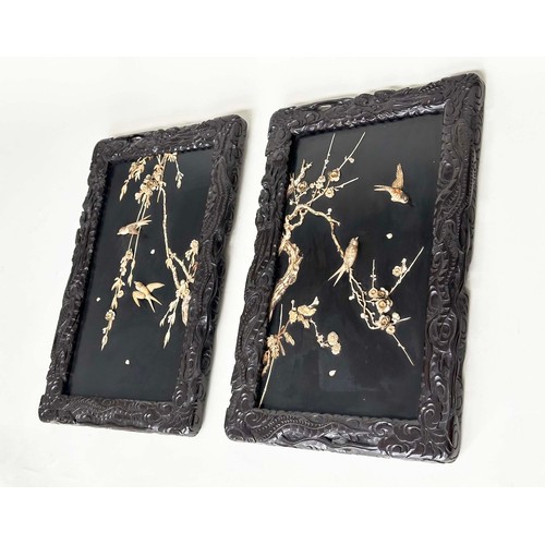 40 - WALL PANELS, 71cm x 46cm, a pair, 19th century Japanese, each with carved bird and foliage decoratio... 