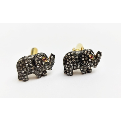 29 - PAIR OF ELEPHANT SHAPED CUFFLINKS, set with rose-cut diamonds and ruby set eyes, gold plated Diamond... 