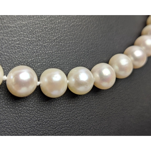 30 - A CULTURED PEARL SINGLE STRAND NECKLACE, fitted with approximately 53 pearls each of approximately 7... 