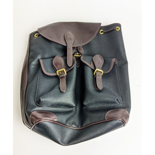 13A - MULHOLLAND TRAVEL SET, three pieces, leather, with brass tone hardware, a backpack 40cm x 30cm x 15c... 