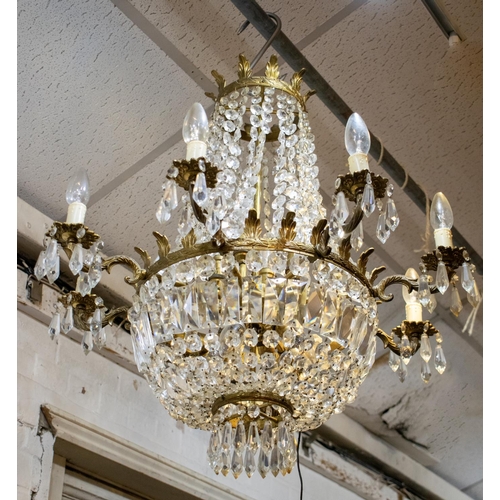 804 - CHANDELIER, approx 79cm H x 66cm, brass with glass drops, sixteen lights and eight branches.