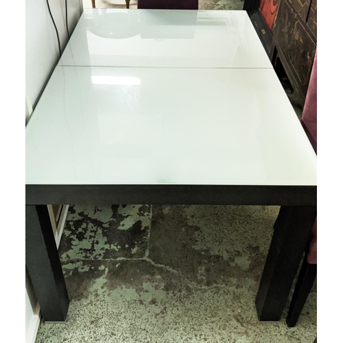 800 - DINING TABLE, 140cm L x 90cm W x 74cm H, white glass top, and six Ligne Roset dining chairs in purpl... 