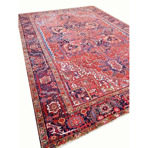 74 - ANTIQUE PERSIAN HERIZ CARPET, 410cm x 299cm.