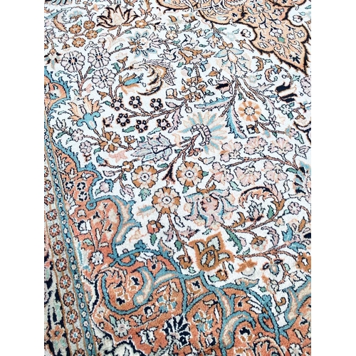 76 - FINE PURE SILK HEREKE DESIGN CARPET, 280cm x 190cm.