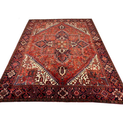 75 - FINE PERSIAN HERIZ CARPET, 327cm x 258cm.