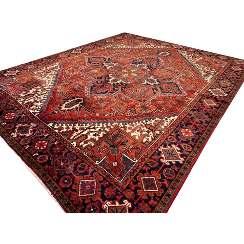 75 - FINE PERSIAN HERIZ CARPET, 327cm x 258cm.