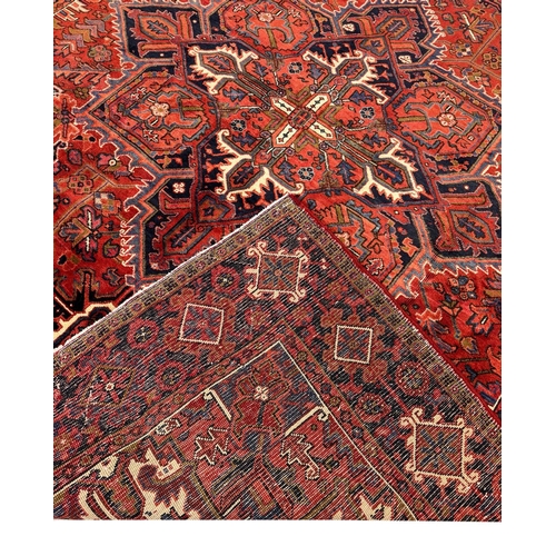 75 - FINE PERSIAN HERIZ CARPET, 327cm x 258cm.